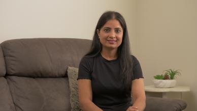 Rajvir sitting on a couch