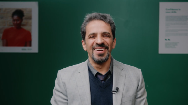 Seyed in front of a green background