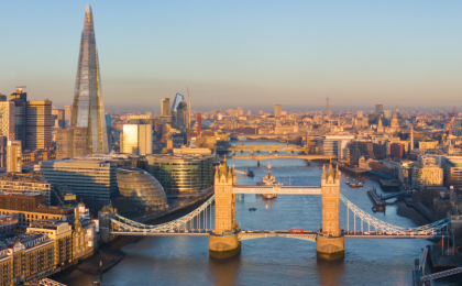 An image of the London skyline in golden hour