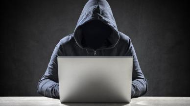 Image representing a scammer on a laptop